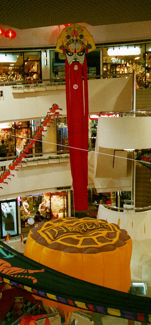 Size Comparision, the Mask Kite towering over the Inflatable Moon Cake.